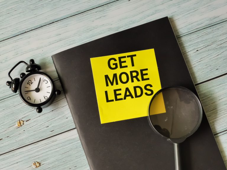 phrase-get-more-leads-written-on-sticky-note-with